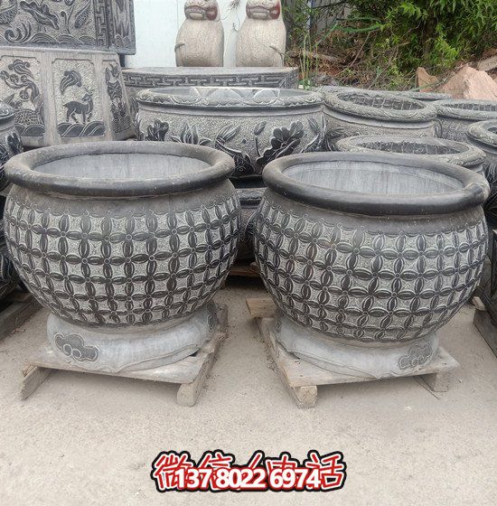 自然美學(xué)結(jié)合青石石雕、浮雕、編織、雕塑的戶外園林魚缸